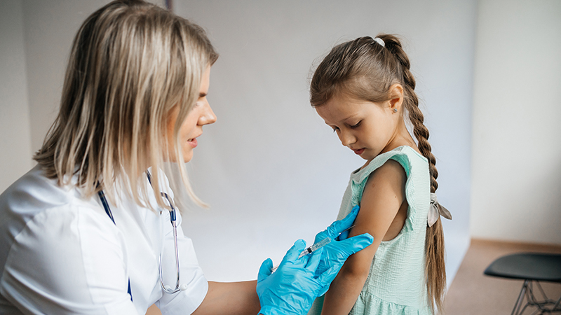 young girl getting injection