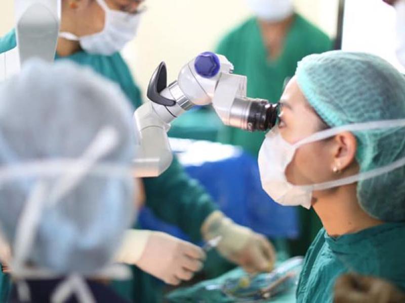 An performing surgery in India